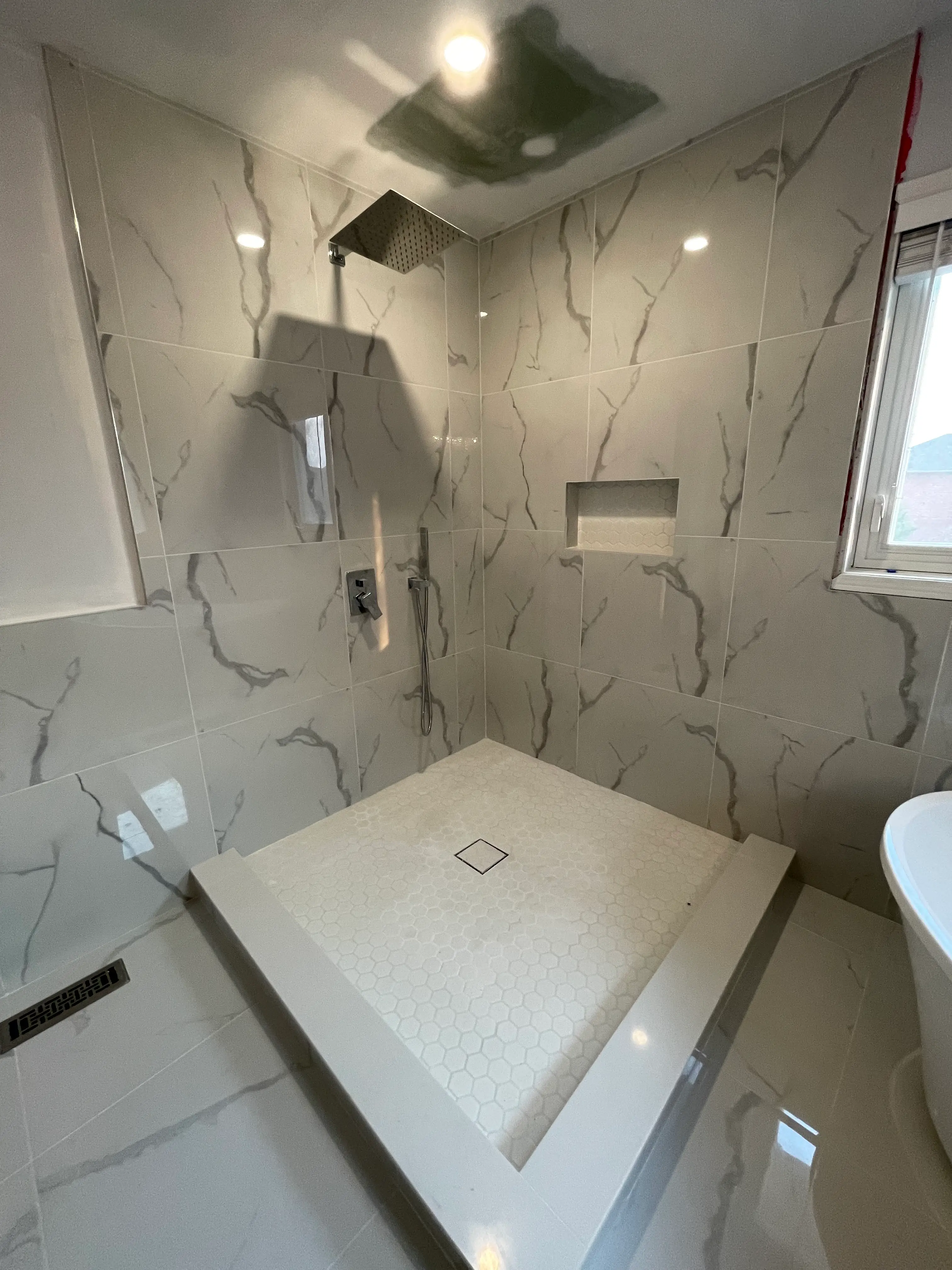 Three-piece bathroom in a basement apartment conversion