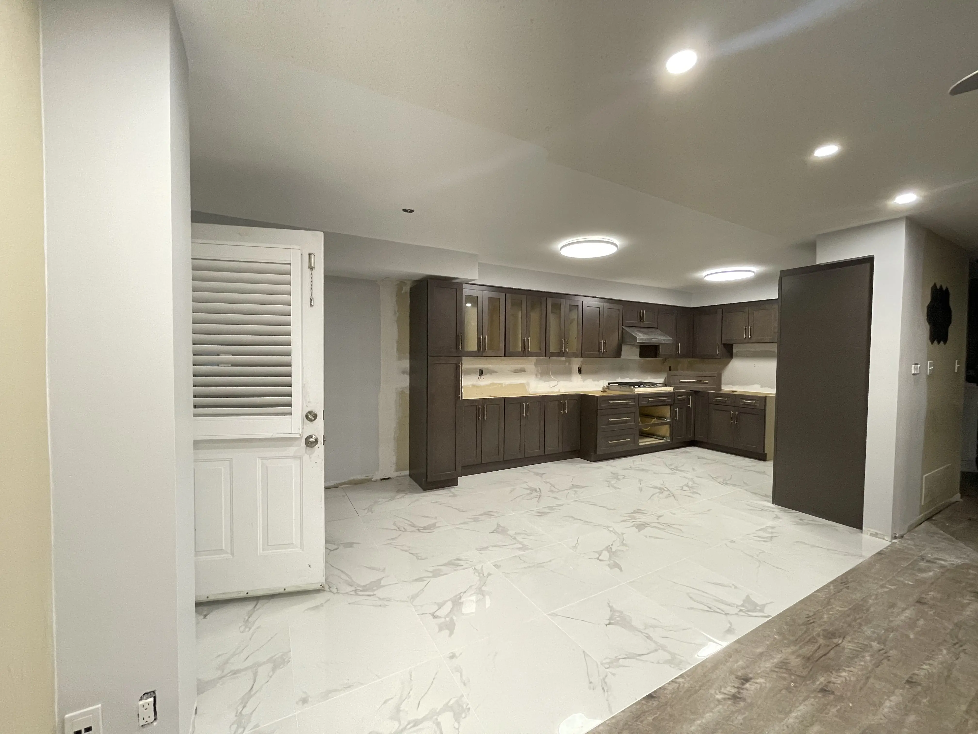 Kitchen in a legal basement apartment conversion